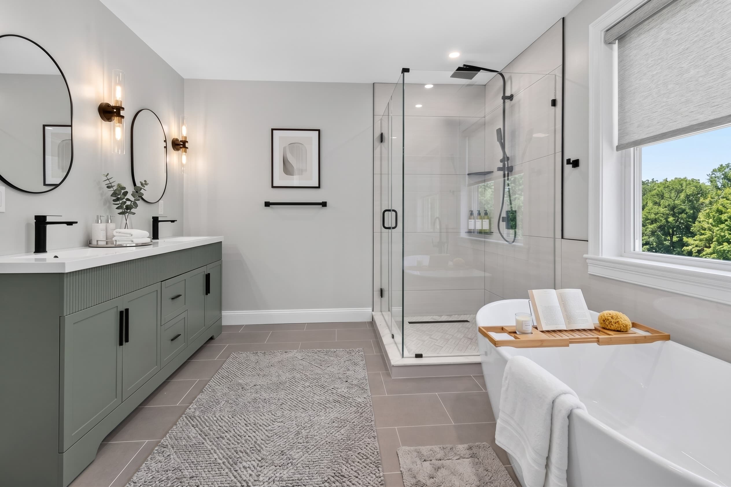 27A primary spa bath with freestanding soaking tub and sage vanity